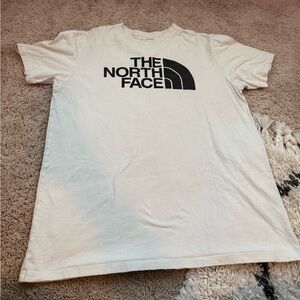 tan north face t shirt. perfect condition. size large